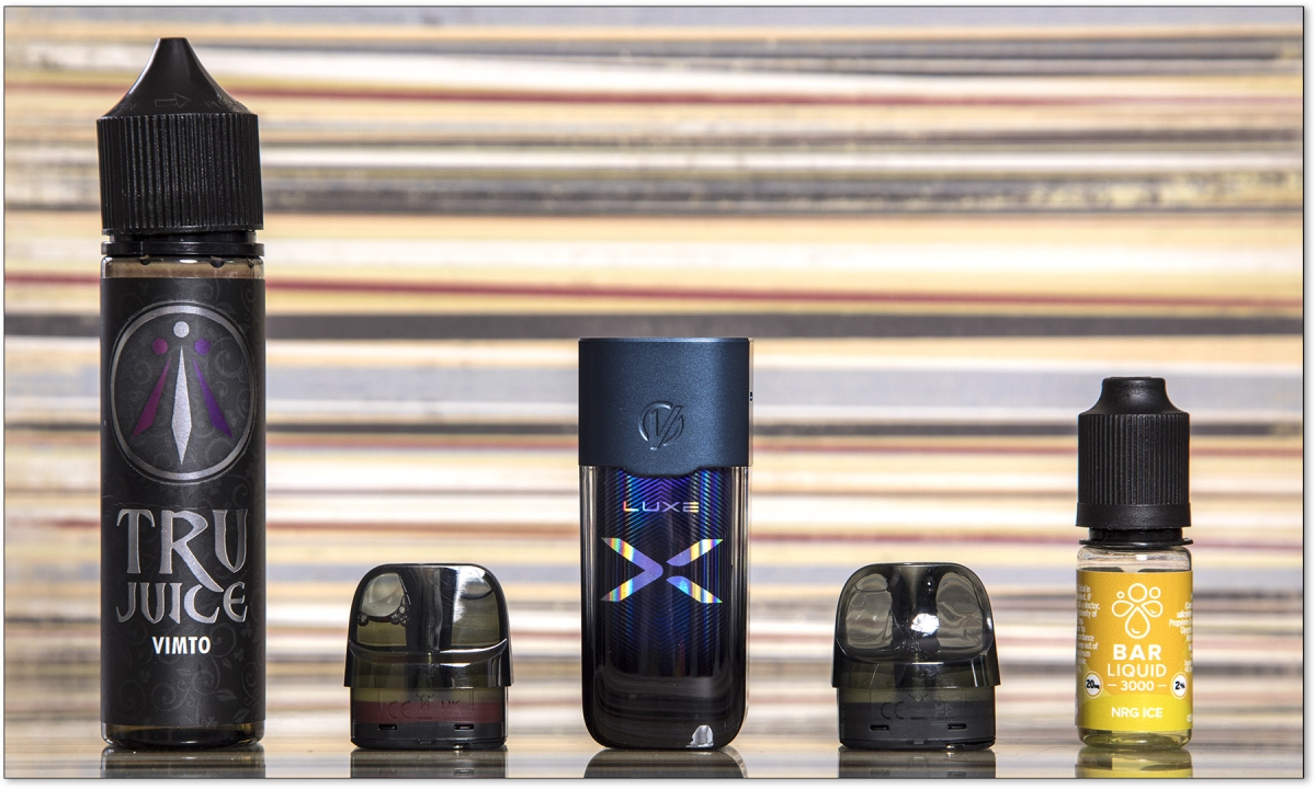 Vaporesso Luxe X Pod Kit with different style e-liquids
