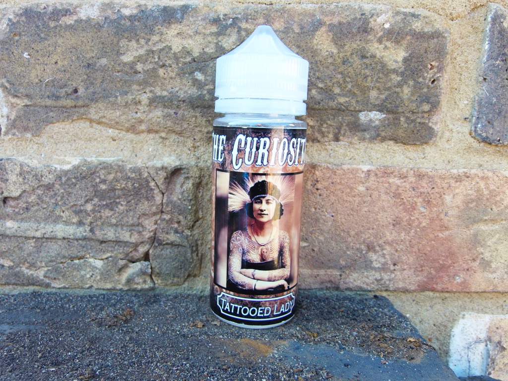The Curiosities by Can Vape Distro Uk Tattoed Lady